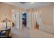 Hallway featuring doorways leading to the various rooms of the house at 8259 W Carol Ave, Peoria, AZ 85345