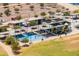 Aerial shot of the shaded playground and splash pad at Pioneer Community Park at 8259 W Carol Ave, Peoria, AZ 85345