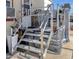 A ramp leads to a small deck, offering accessible entry and outdoor living space at 8421 E Main St # 116, Mesa, AZ 85207