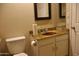 This bathroom features updated vanity, mirror, and fixtures at 10326 W Harmont Dr, Peoria, AZ 85345
