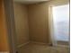 Cozy bedroom with carpeted floors and plenty of natural light at 10326 W Harmont Dr, Peoria, AZ 85345