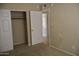 Neutral bedroom with carpet and access to closet at 10326 W Harmont Dr, Peoria, AZ 85345