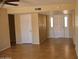 An entryway featuring tile floors and a glass-accented front door that welcomes visitors at 10326 W Harmont Dr, Peoria, AZ 85345
