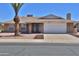 Charming single-story home featuring a two-car garage and low-maintenance landscaping at 10326 W Harmont Dr, Peoria, AZ 85345