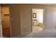 Spacious main bedroom leading to the main bath and walk in closet at 10326 W Harmont Dr, Peoria, AZ 85345