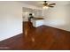 Bright living space with hardwood floors, neutral walls, and an open view to the kitchen at 1048 E 6Th Ave, Mesa, AZ 85204
