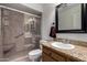 Well-maintained bathroom featuring a walk-in shower, modern vanity, and updated fixtures at 1066 Leisure World --, Mesa, AZ 85206
