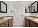 Bathroom featuring double sinks, granite counters, and modern fixtures at 1066 Leisure World --, Mesa, AZ 85206