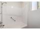 Bathroom featuring tub with a shower and a window with plenty of natural light at 1066 Leisure World --, Mesa, AZ 85206