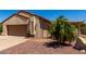 Tan home exterior with desert landscaping and a view of the attached garage at 1066 Leisure World --, Mesa, AZ 85206
