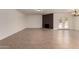 Bright, open living room featuring tile floors, a brick fireplace, and patio doors at 1066 Leisure World --, Mesa, AZ 85206