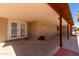 Large covered patio with glass doors and ample outdoor living space at 1066 Leisure World --, Mesa, AZ 85206