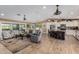 Bright open concept with an easy flow between the living room, dining area, and modern kitchen at 1087 Leisure World --, Mesa, AZ 85206