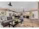 Expansive open-concept living space, seamlessly connecting the cozy living area to the modern kitchen at 1087 Leisure World --, Mesa, AZ 85206