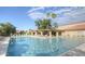 Sparkling community pool with inviting lounge area and clear blue water, perfect for relaxation and recreation at 1087 Leisure World --, Mesa, AZ 85206
