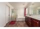 Clean bathroom with double vanity, shower and soaking tub, perfect for relaxation at 1120 E Jahns Dr, Casa Grande, AZ 85122
