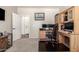 Bright office with built-in shelving and cabinets, perfect for a home workspace at 1120 E Jahns Dr, Casa Grande, AZ 85122