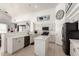 Contemporary kitchen with stainless steel appliances, quartz countertops and island, plus sleek cabinetry at 15811 N 155Th Dr, Surprise, AZ 85374
