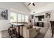 Spacious living room boasts high ceilings, ample natural light, and a comfortable seating area at 15811 N 155Th Dr, Surprise, AZ 85374