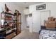 Bedroom featuring a shelf, closet and decorated walls at 1662 E Kingman Pl, Casa Grande, AZ 85122