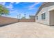 View of the backyard featuring block wall and ample space for customization at 1960 N Loretta Pl, Casa Grande, AZ 85122