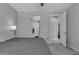 Serene bedroom features a bed, access to ensuite bathroom and closet, and soft, neutral gray walls at 1960 N Loretta Pl, Casa Grande, AZ 85122