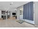 Open-concept living area showcases the kitchen, Gathering room, and sliding glass doors that lead to outdoor patio at 1960 N Loretta Pl, Casa Grande, AZ 85122