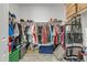 Organized walk-in closet with ample shelving, hanging space, and storage solutions for clothing and accessories at 1960 N Loretta Pl, Casa Grande, AZ 85122