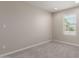 Bedroom featuring carpet floors, neutral wall color and a window that provides ample natural light at 2000 N 36Th St # 14, Phoenix, AZ 85008