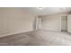 Spacious primary bedroom with a walk-in closet and carpet floors at 2000 N 36Th St # 14, Phoenix, AZ 85008