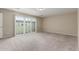 Carpeted bedroom with sliding glass door at 2000 N 36Th St # 14, Phoenix, AZ 85008