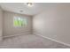 Bedroom featuring carpet floors, neutral wall color and a window that provides ample natural light at 2000 N 36Th St # 14, Phoenix, AZ 85008