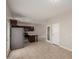 Open kitchen adjacent to a dining or Gathering area; stainless steel appliances, and access to doors at 2000 N 36Th St # 14, Phoenix, AZ 85008