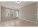 Bright living area featuring neutral walls, tile flooring, and large windows at 2000 N 36Th St # 14, Phoenix, AZ 85008