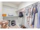 Walk-in closet with clothing racks and shelves, providing ample storage space for organizing apparel at 2020 W Union Hills Dr # 156, Phoenix, AZ 85027