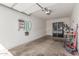 Functional garage with overhead door, storage cabinets, and workspace, offering secure parking and storage at 2020 W Union Hills Dr # 156, Phoenix, AZ 85027