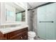 Updated bathroom featuring modern fixtures, vanity, and a glass-enclosed shower at 2109 E Gelding Dr, Phoenix, AZ 85022