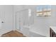 Modern bathroom showcasing a bathtub and glass-enclosed shower at 2459 E Lindrick Dr, Gilbert, AZ 85298