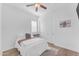 Bright bedroom with a ceiling fan provides a comfortable space with natural light at 2459 E Lindrick Dr, Gilbert, AZ 85298