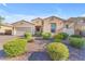 Well-maintained single-story home featuring manicured landscaping and a welcoming entrance in a desirable neighborhood at 2459 E Lindrick Dr, Gilbert, AZ 85298