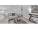 Comfortable living room features neutral tones, plush seating, wood-look flooring, and stylish decorations at 2459 E Lindrick Dr, Gilbert, AZ 85298