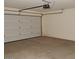 Spacious two car garage with automatic door opener and plenty of room for parking and storage at 25744 W Winston Dr, Buckeye, AZ 85326