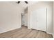 Bright bedroom with closet and wood floors for a modern look at 25960 W Tonto Ln, Buckeye, AZ 85396