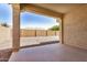 Covered patio overlooking a low-maintenance backyard at 25960 W Tonto Ln, Buckeye, AZ 85396