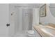 Charming bathroom showcasing a modern shower with decorative tile, neutral vanity, and stylish accents at 2911 E Leland St, Mesa, AZ 85213