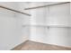 Walk-in closet featuring carpet and built-in shelving at 2911 E Leland St, Mesa, AZ 85213