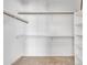 Walk-in closet featuring carpet and built-in shelving at 2911 E Leland St, Mesa, AZ 85213