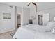 Bright bedroom with a ceiling fan, carpeted floor, and neutral decor at 2911 E Leland St, Mesa, AZ 85213