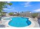 Beautiful backyard view with pool, spa and covered patio perfect for relaxation and entertainment at 2911 E Leland St, Mesa, AZ 85213