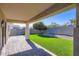 Beautiful covered patio with pavers and artificial grass, great for entertaining at 29688 W Indianola Ave, Buckeye, AZ 85396